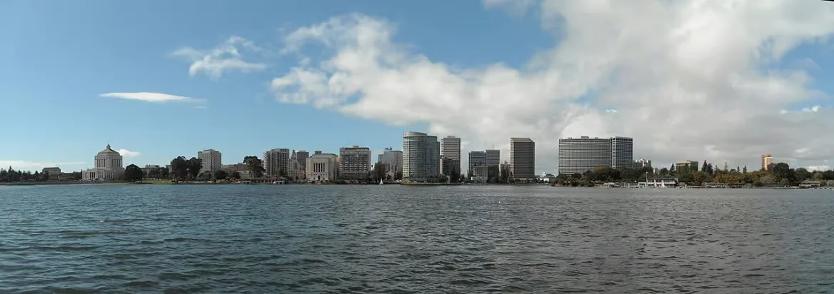 Oakland skyline view from Lake Merritt, a favorite spot for Oakland movers and new residents settling into the city