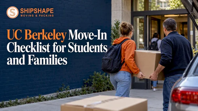 Student and parent carry a box into Berkeley housing