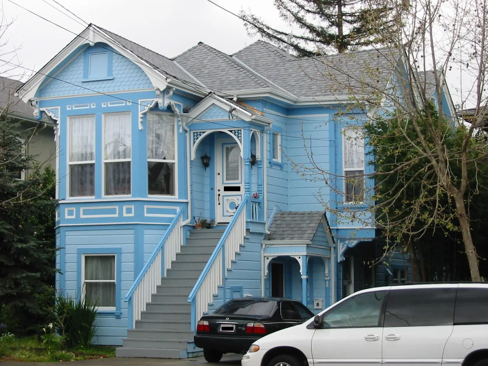 Victorian house with a blue facade in Alameda, California